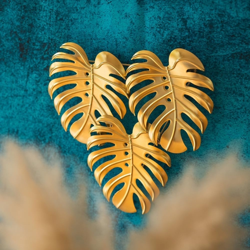 Wanddecoratie Monstera metaal goudkleurig 42 cm